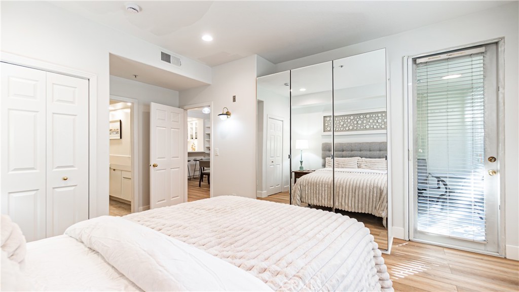 2233 Martin, Unit 109 Irvine, CA 92612 - Photo 28 of 54 a bedroom with a bed and a window