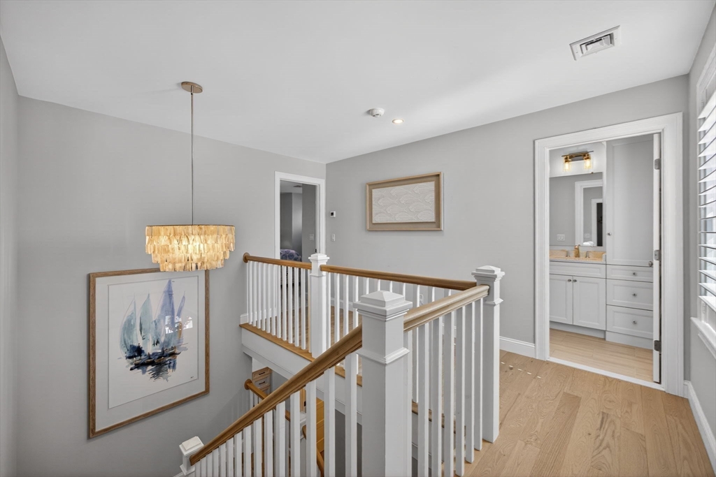42 Cobblestone Circle Mashpee, MA 02649 - Photo 21 of 40 a view of a hallway with entryway window and stairs
