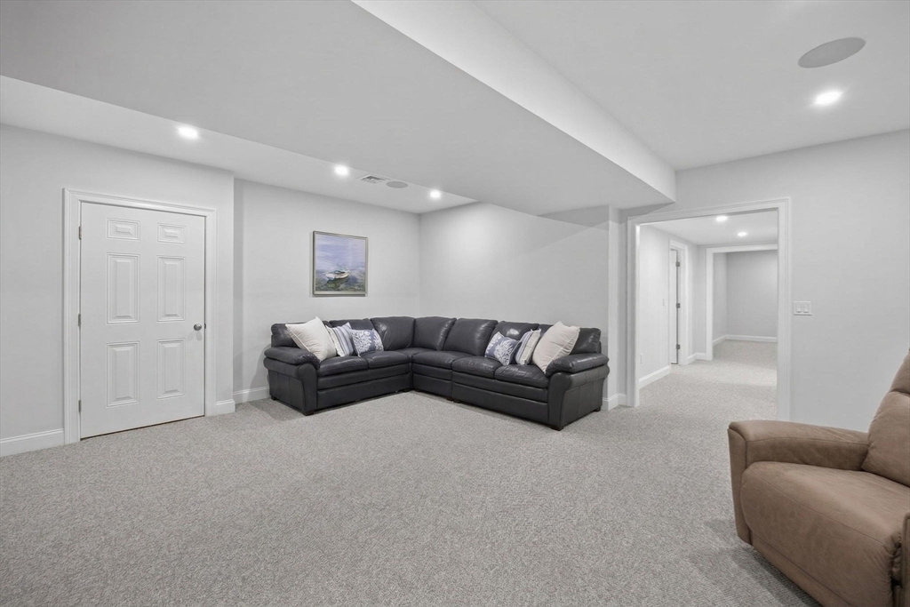 42 Cobblestone Circle Mashpee, MA 02649 - Photo 23 of 40 a living room with furniture and a couch
