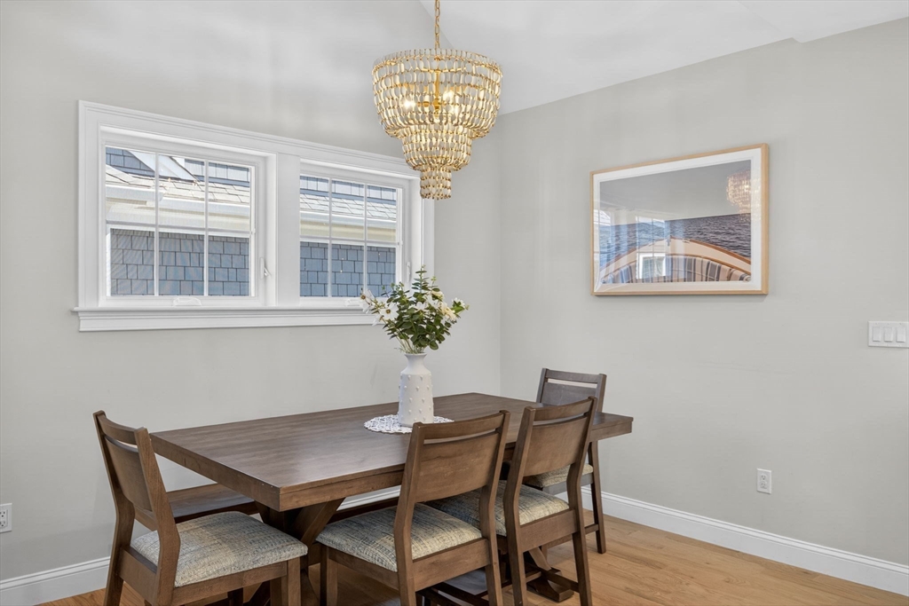 42 Cobblestone Circle Mashpee, MA 02649 - Photo 6 of 40 a dining room with furniture and chandelier
