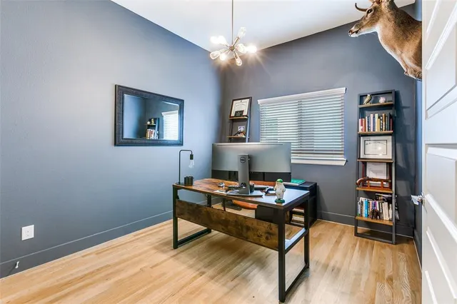 a bathroom with a tub a sink shower and mirror