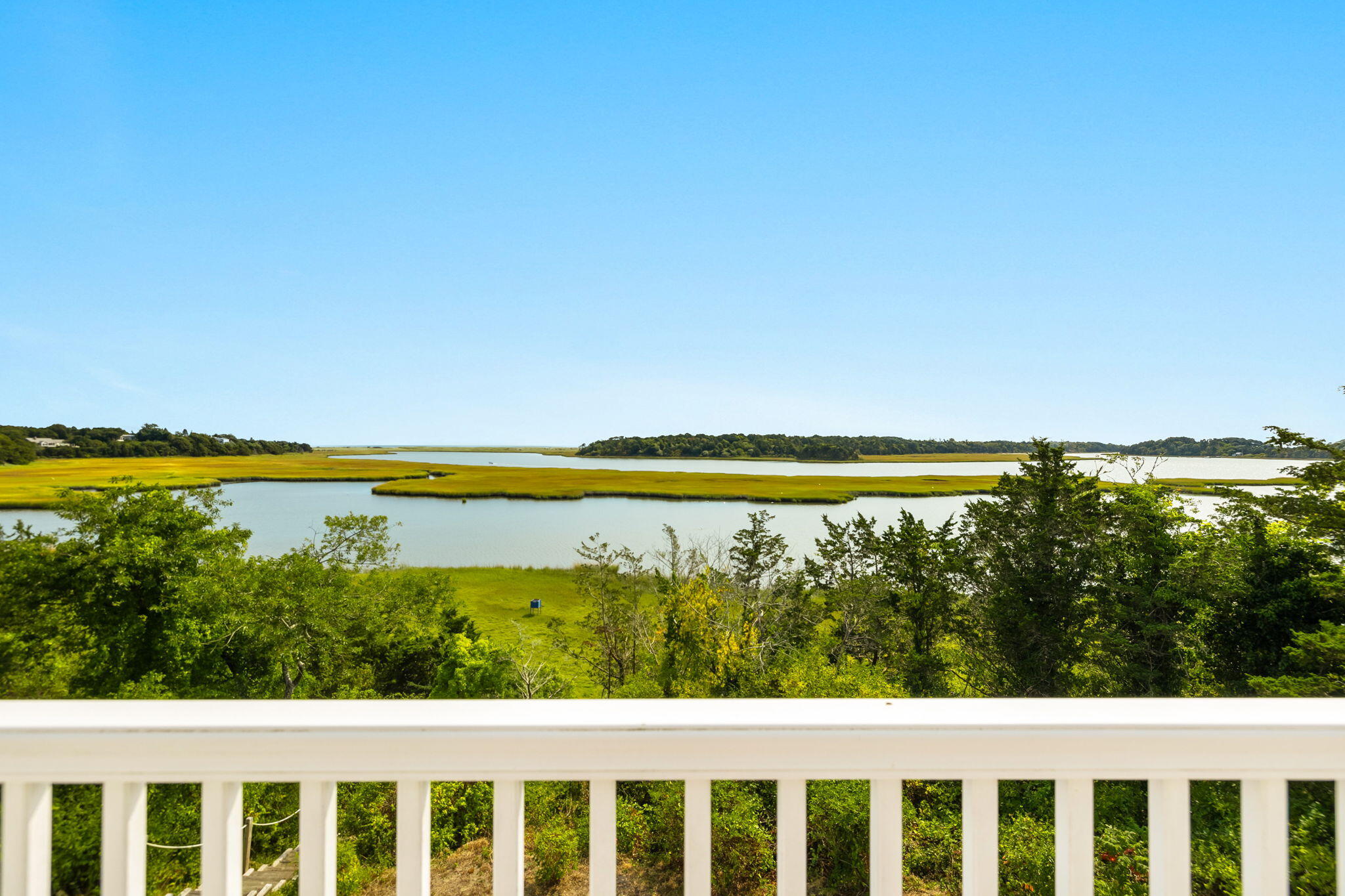 63 Briar Spring Road Orleans, MA 02653 - Photo 26 of 37 a view of ocean from a balcony