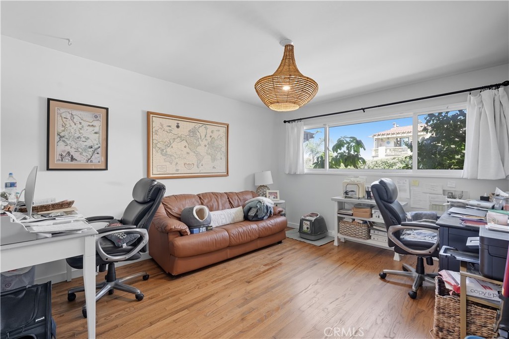 202 West Manchester Avenue Playa del Rey, CA 90293 - Photo 13 of 21 a living room with furniture and a large window