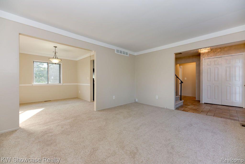 16008 Newburgh Road Livonia, MI 48154 - Photo 9 of 29 Living room leads to Dining Room