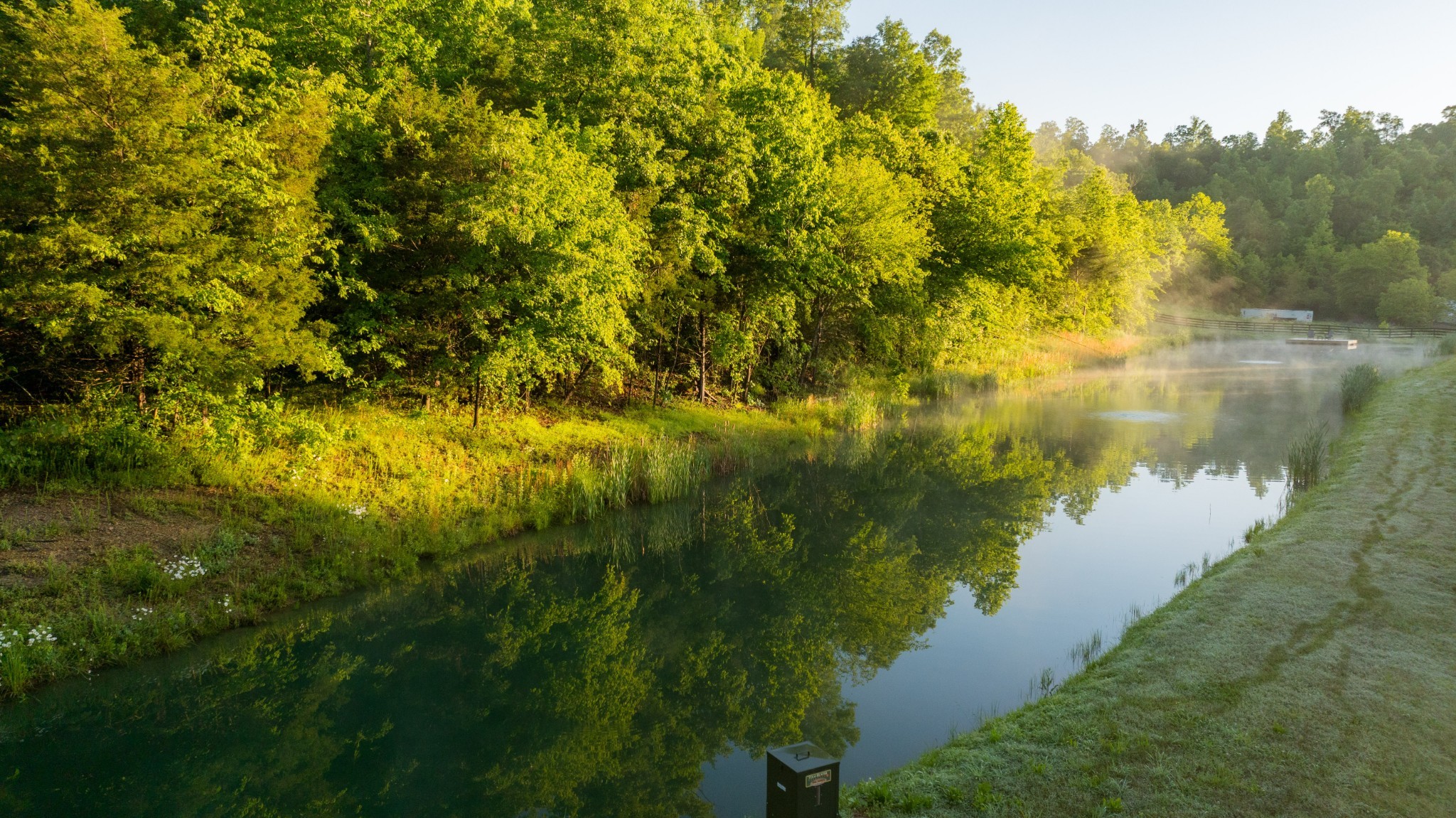7556 Caney Fork Road Fairview, TN 37062 - Photo 29 of 47 a view of a lake with a mountain