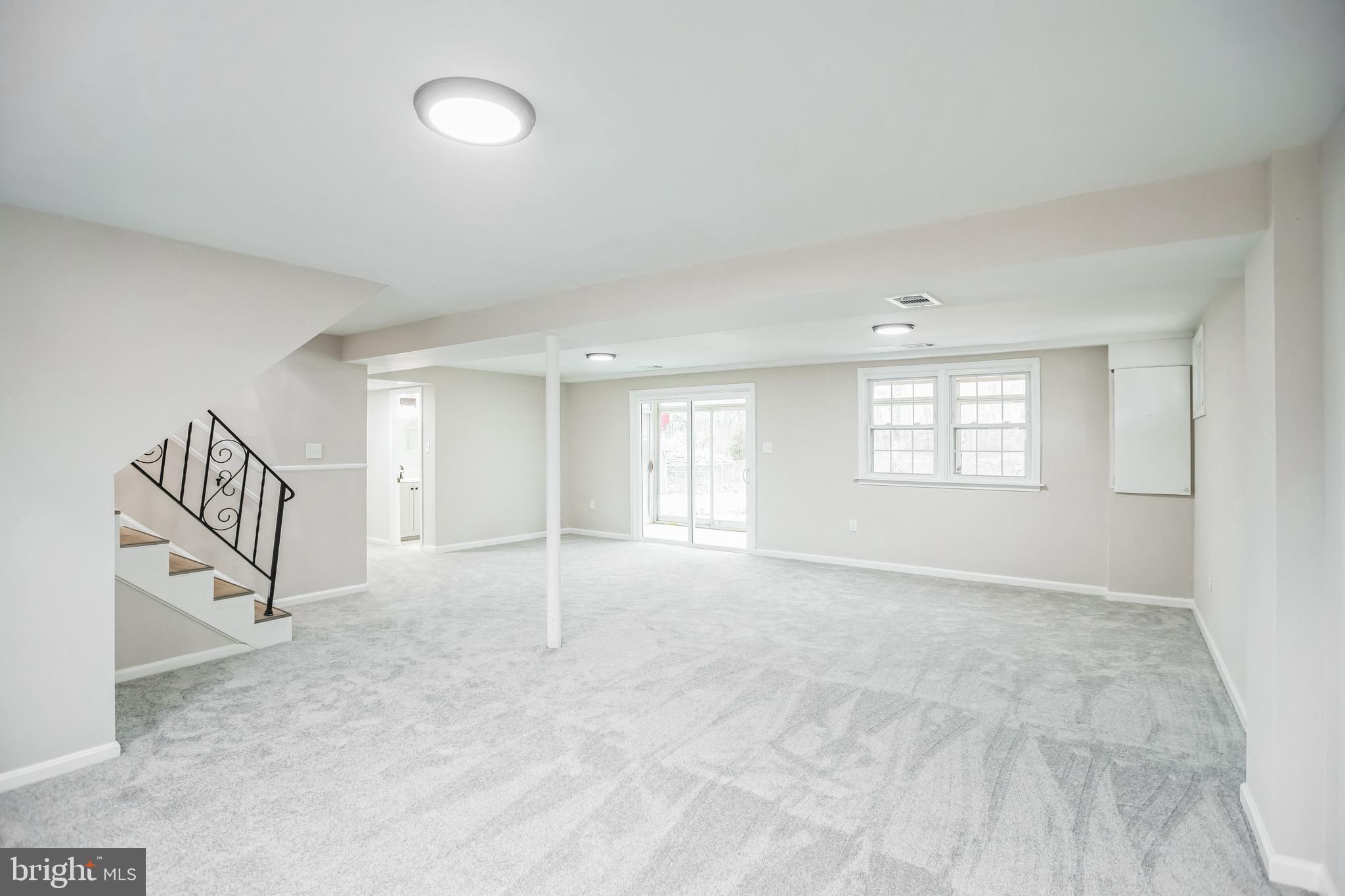 5201 Roblee Drive Upper Marlboro, MD 20772 - Photo 11 of 27 a view of an empty room with a window