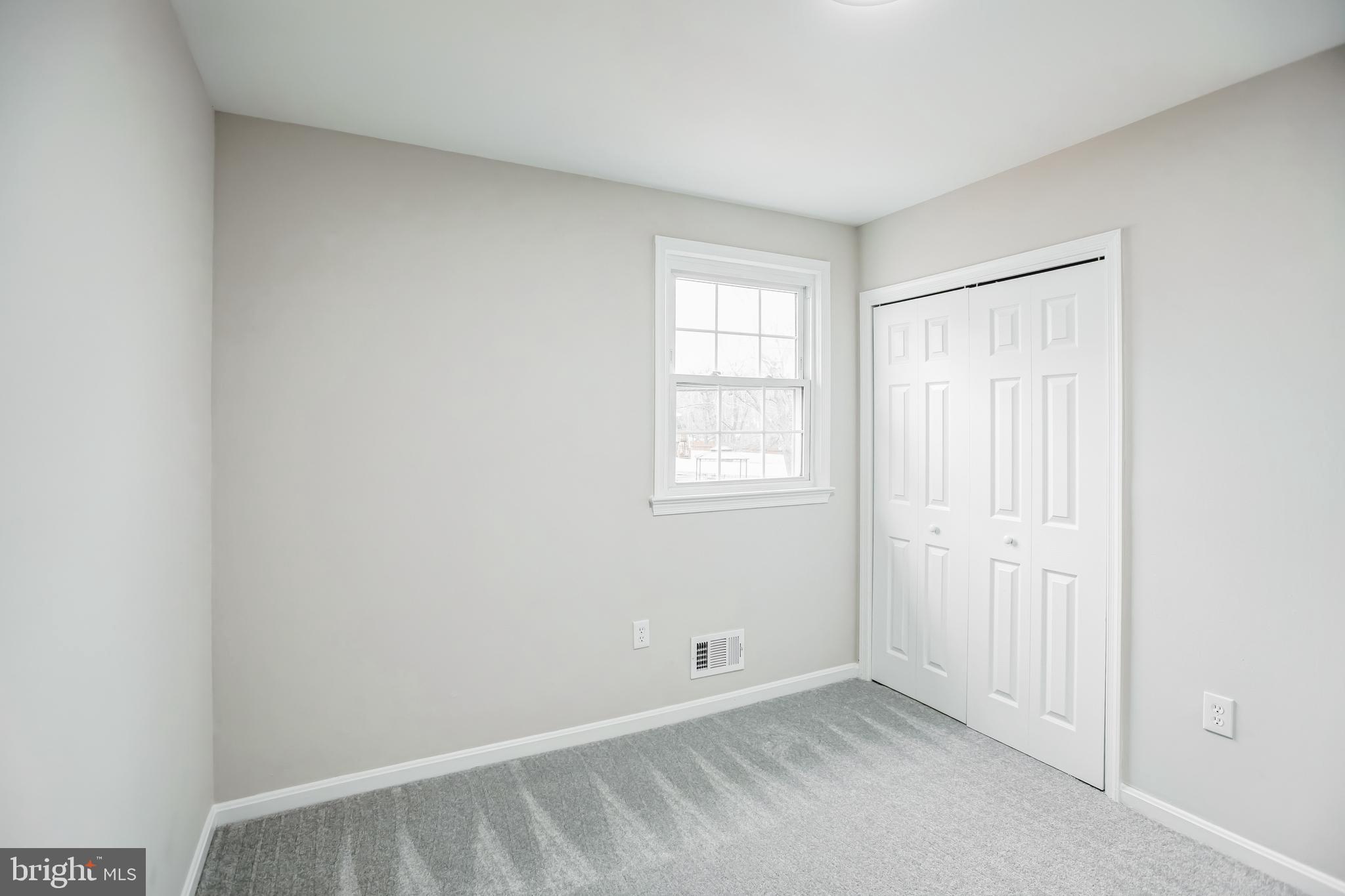 5201 Roblee Drive Upper Marlboro, MD 20772 - Photo 14 of 27 an empty room with windows