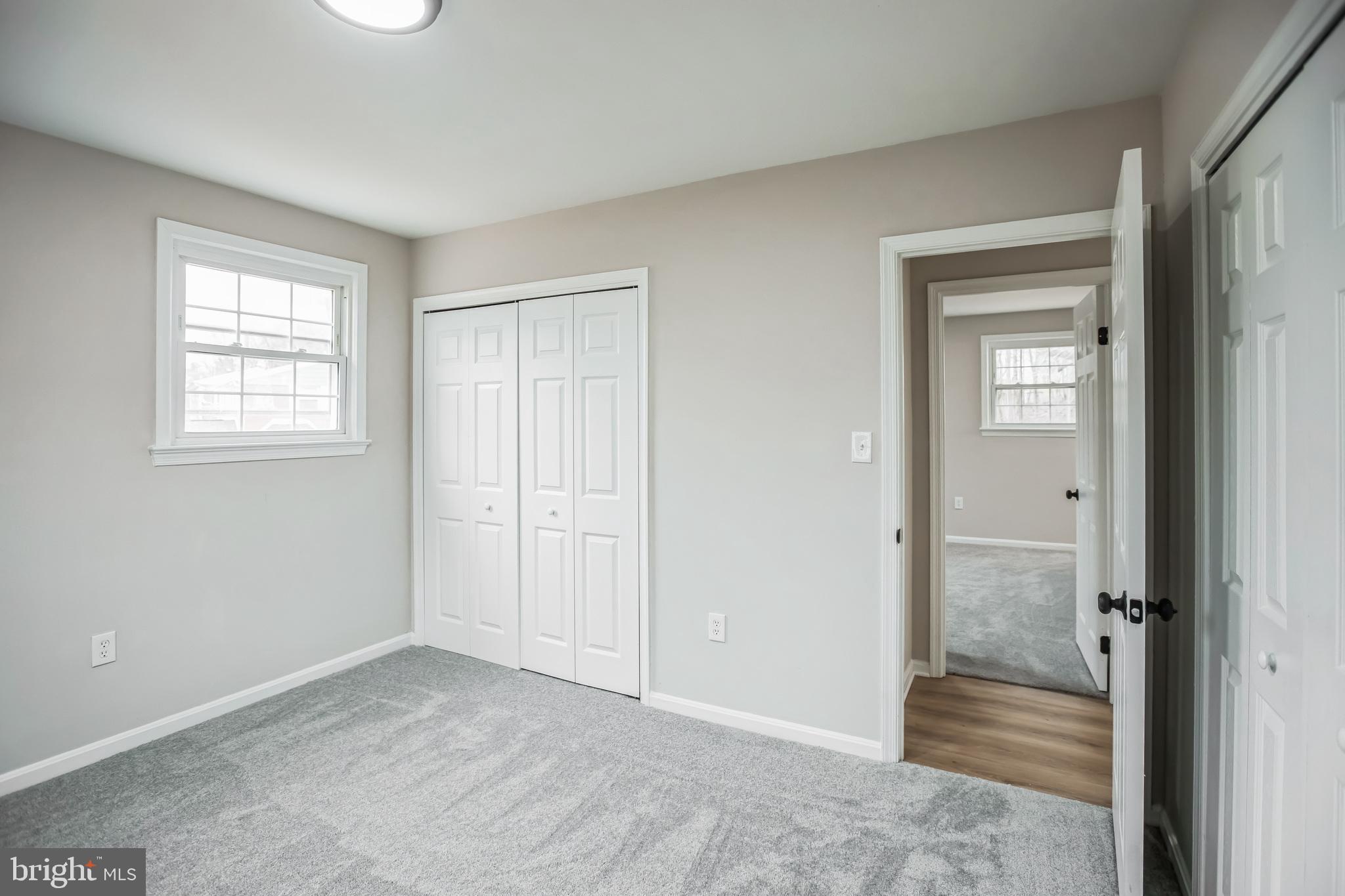 5201 Roblee Drive Upper Marlboro, MD 20772 - Photo 17 of 27 a view of an empty room with closet and a window