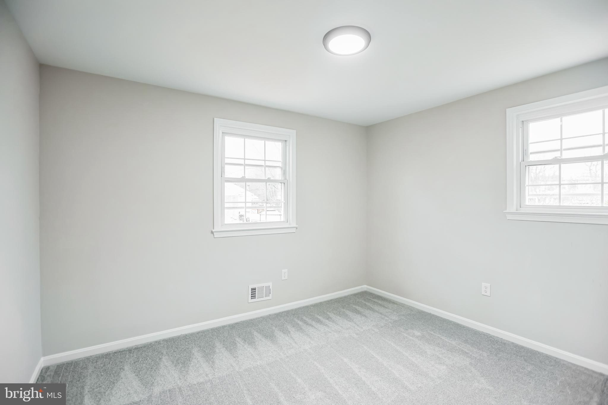 5201 Roblee Drive Upper Marlboro, MD 20772 - Photo 19 of 27 an empty room with a window