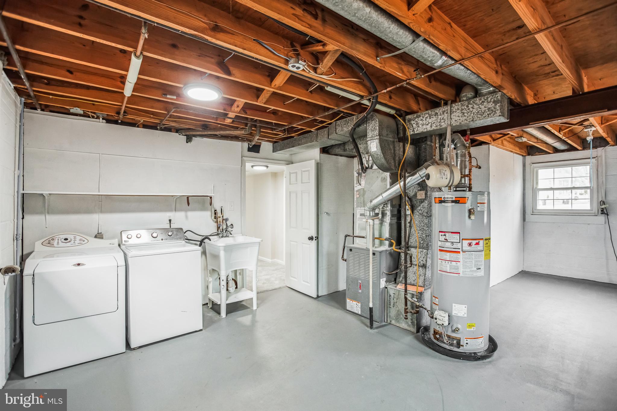 5201 Roblee Drive Upper Marlboro, MD 20772 - Photo 25 of 27 a utility room with dryer and washer