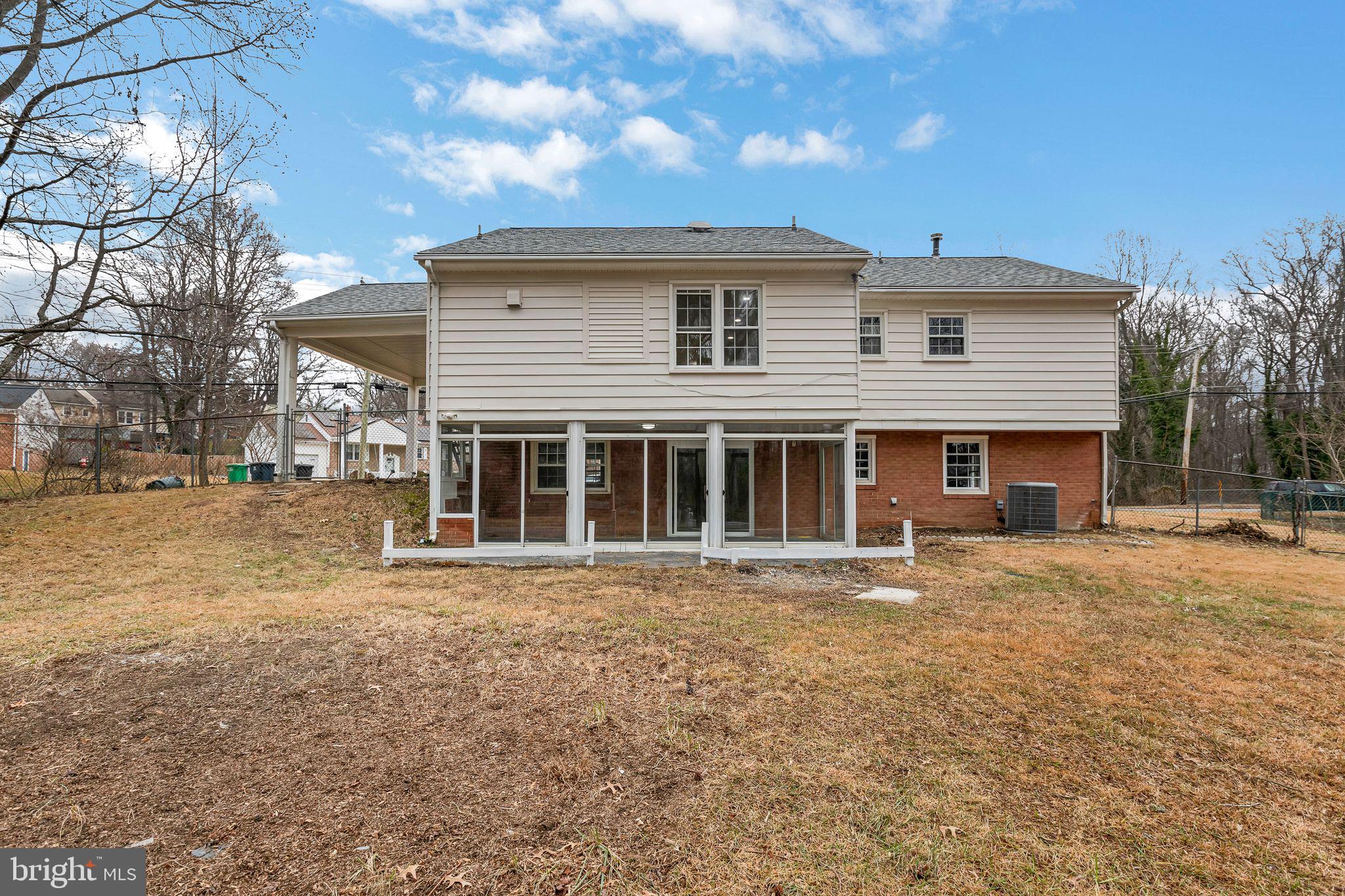 5201 Roblee Drive Upper Marlboro, MD 20772 - Photo 26 of 27 a front view of a house with a garden