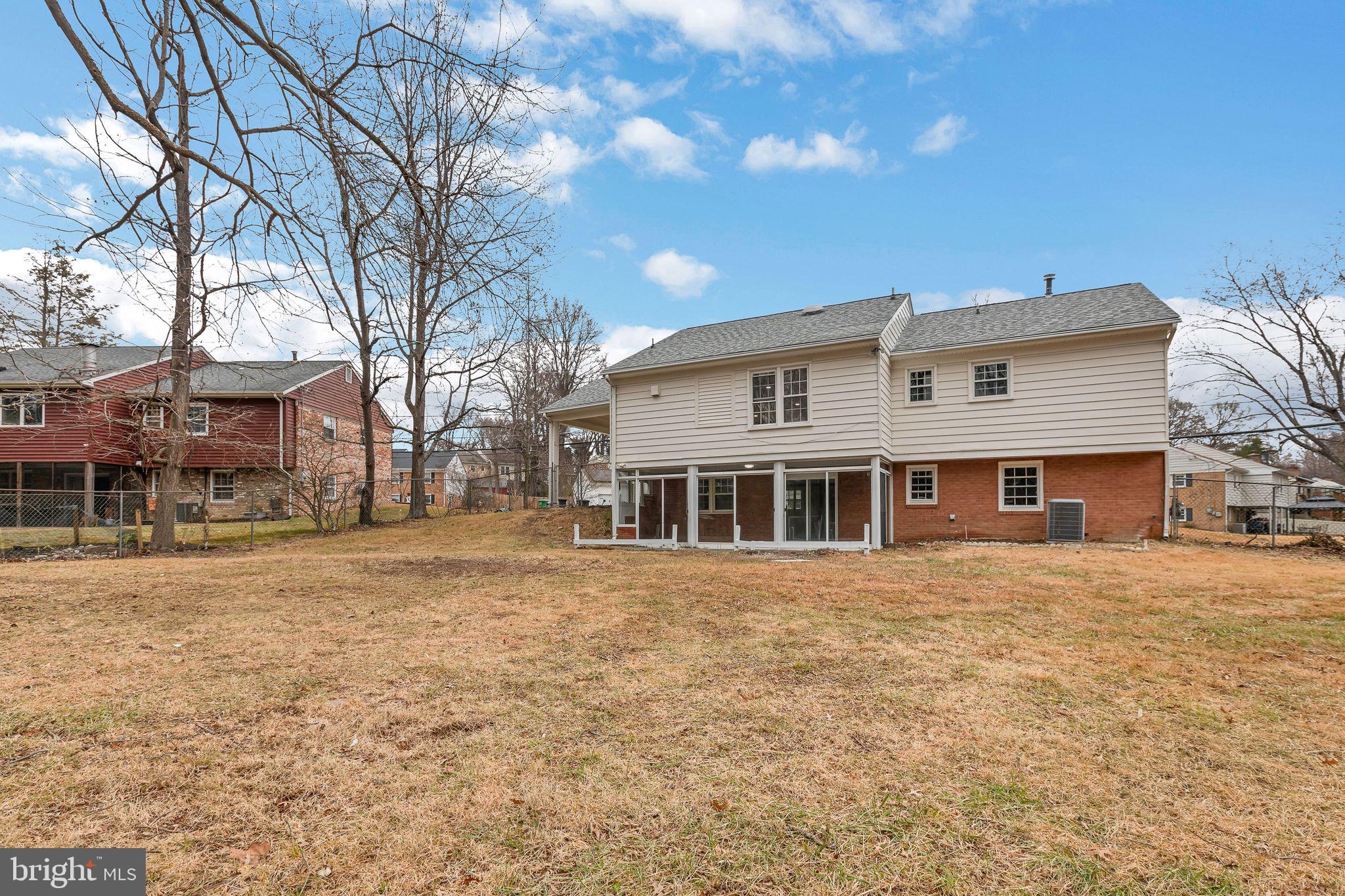 5201 Roblee Drive Upper Marlboro, MD 20772 - Photo 27 of 27 a front view of a house with a yard and garage