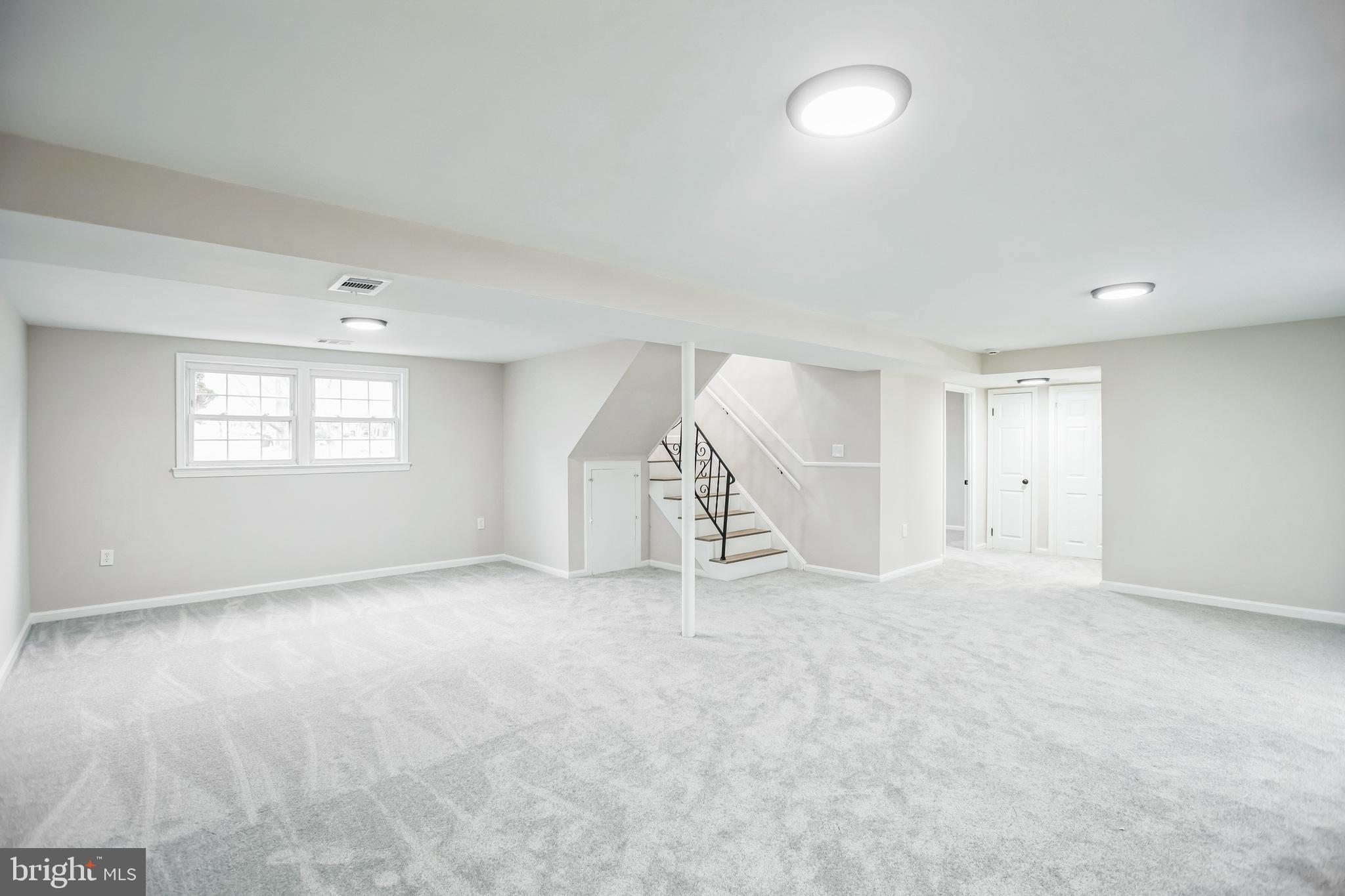 5201 Roblee Drive Upper Marlboro, MD 20772 - Photo 10 of 27 a view of an empty room with a window