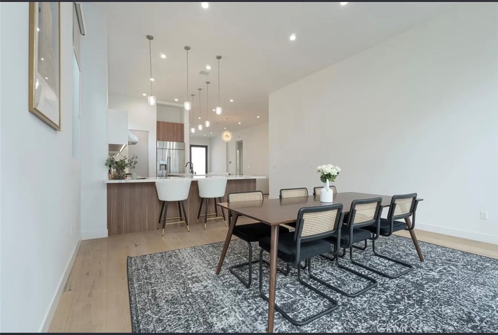 12136 Clarkson Road Los Angeles, CA 90064 - Photo 11 of 23 a view of a dining room with furniture
