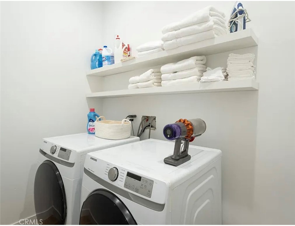 12136 Clarkson Road Los Angeles, CA 90064 - Photo 21 of 23 a utility room with dryer and washer