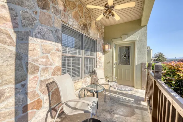 an aerial view of multiple houses with outdoor space