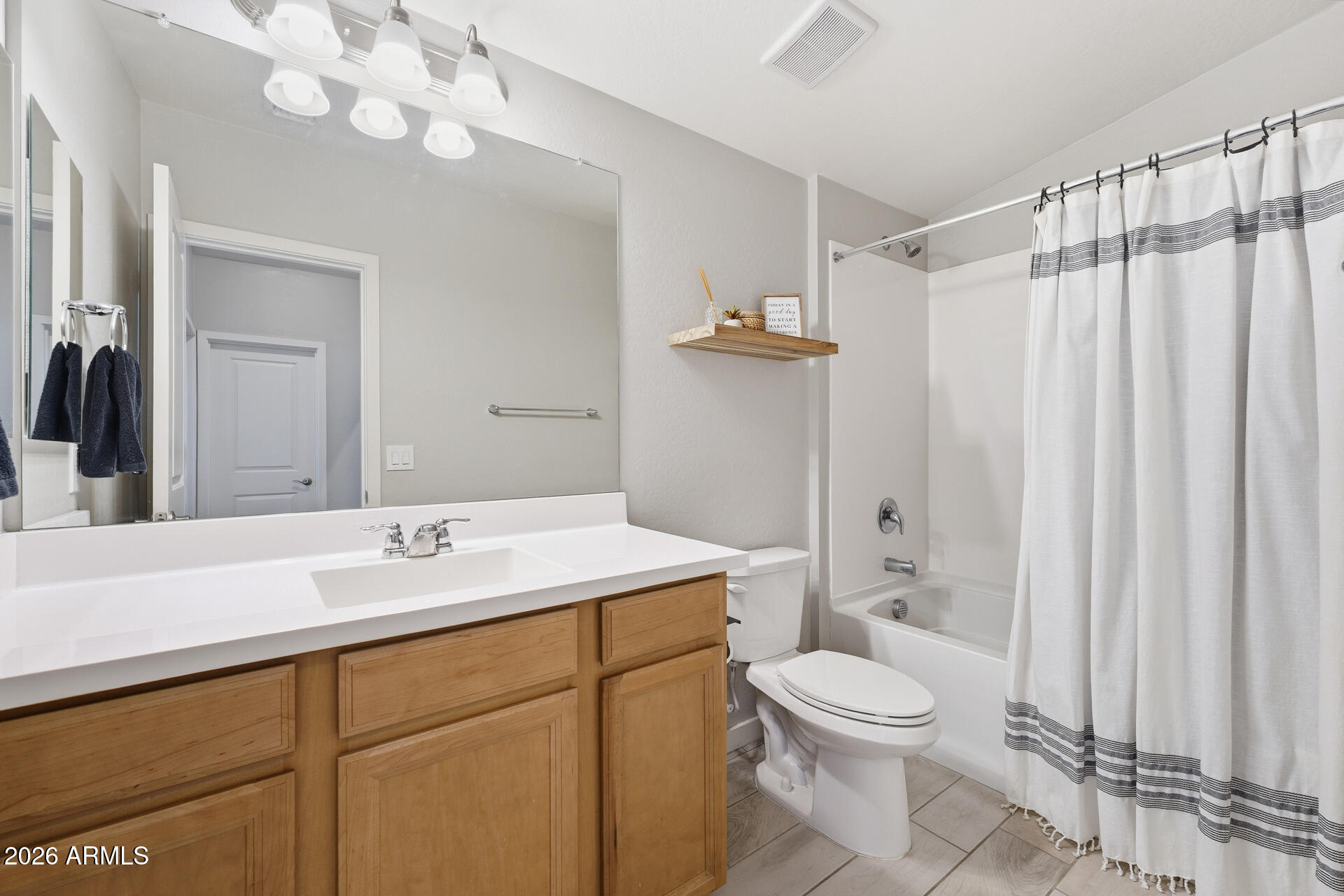 23069 East Mayberry Road Queen Creek, AZ 85142 - Photo 32 of 48 a bathroom with a sink a toilet and shower