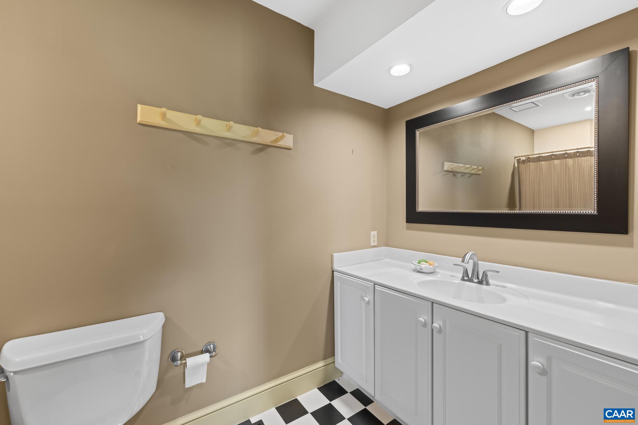 480 Dawsonville Road Barboursville, VA 22923 - Photo 35 of 55 a bathroom with a sink a toilet and mirror