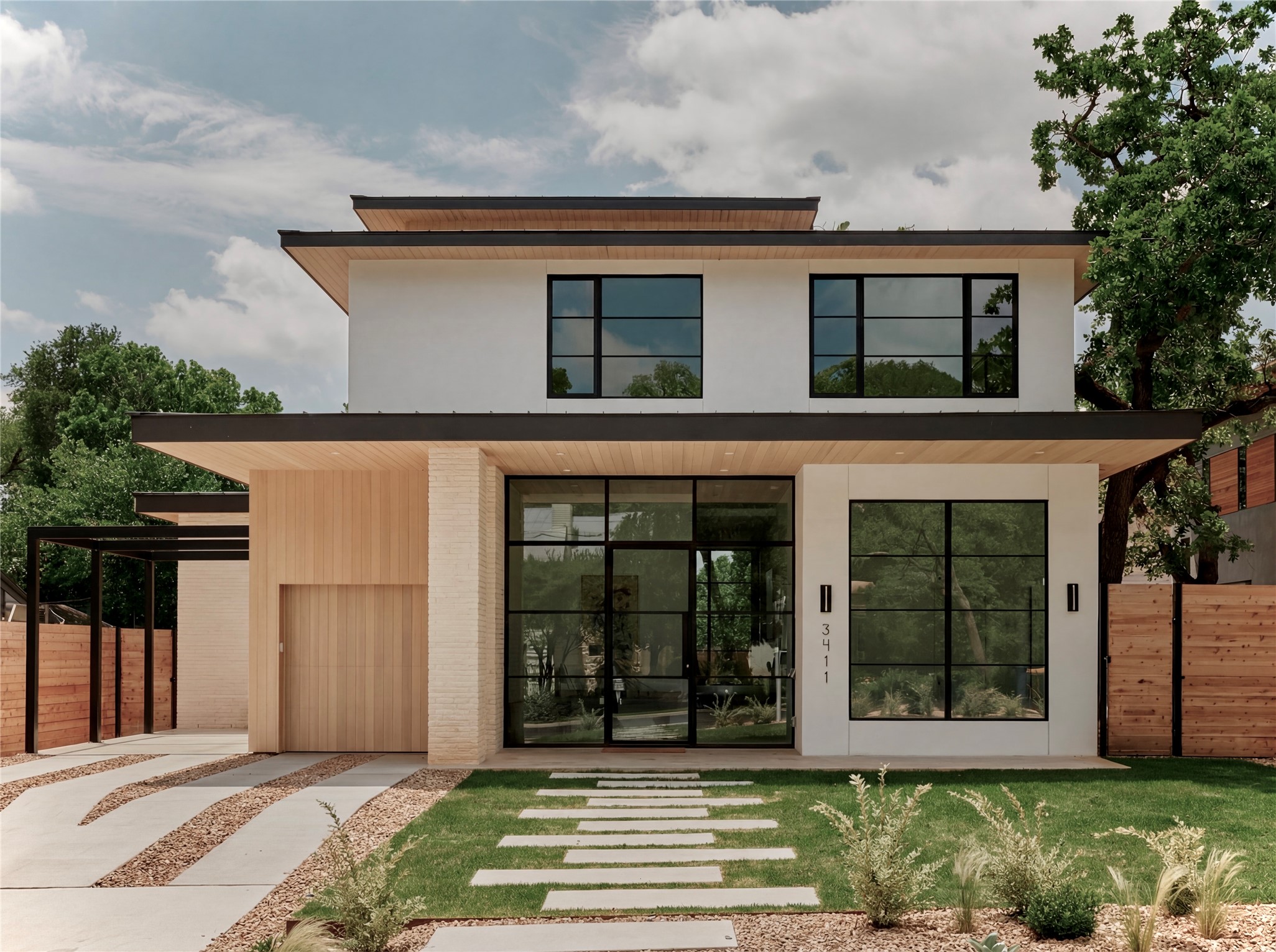3411 Bridle Path Austin, TX 78703 - Photo 2 of 34 a front view of a house with a garden