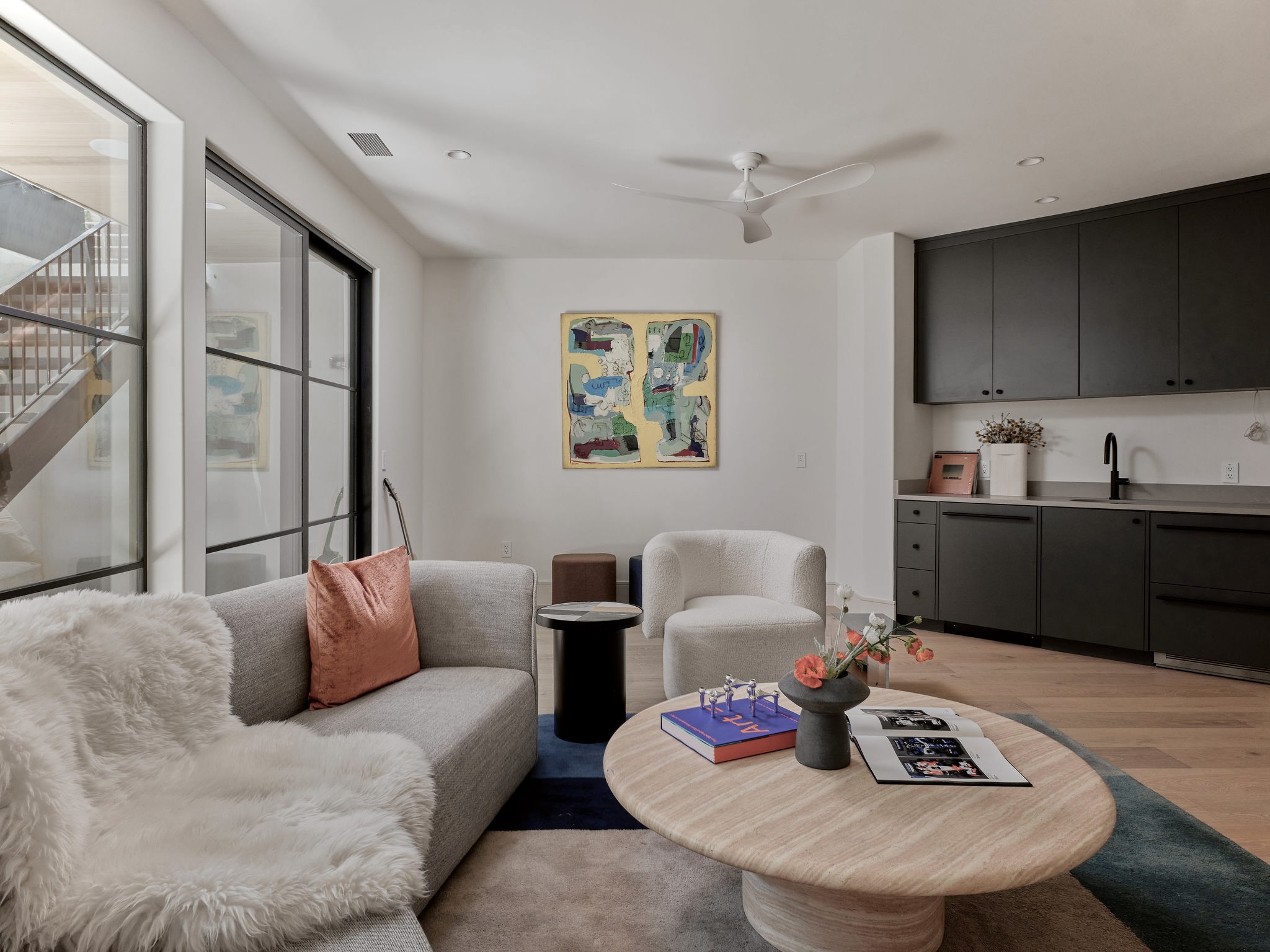 3411 Bridle Path Austin, TX 78703 - Photo 22 of 34 a living room with furniture kitchen view and a large window