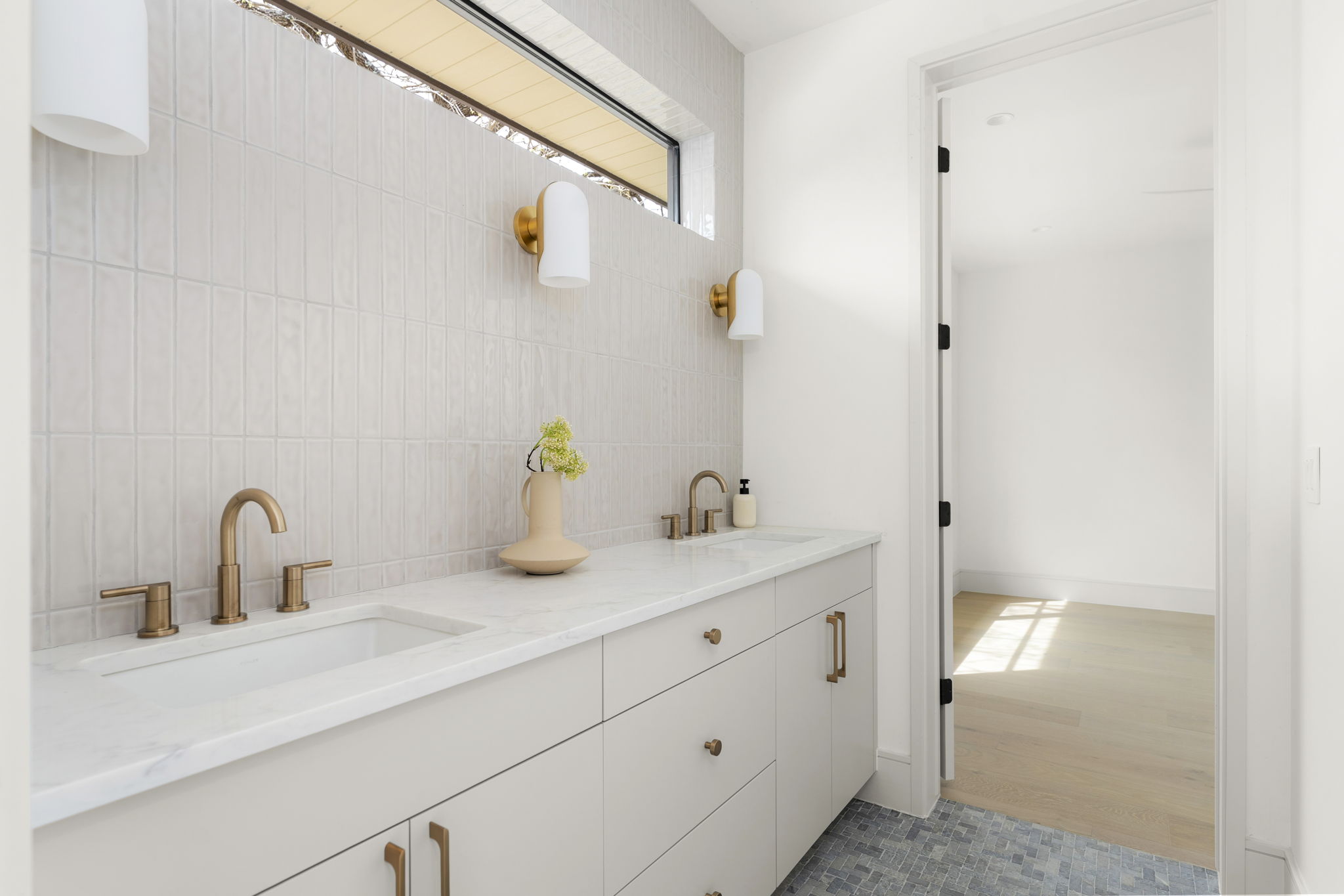 3411 Bridle Path Austin, TX 78703 - Photo 26 of 40 Full bathroom featuring double vanity and decorative backsplash