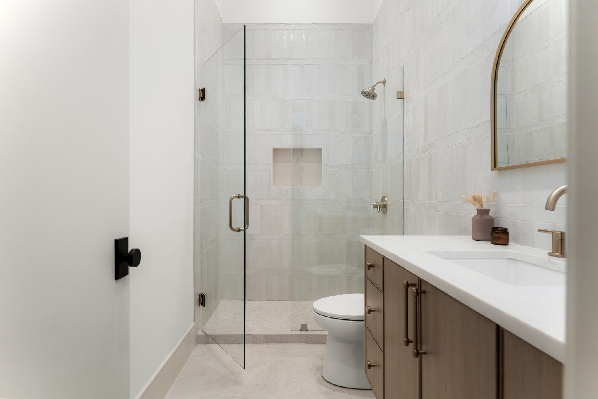 3411 Bridle Path Austin, TX 78703 - Photo 29 of 34 a bathroom with a sink a toilet and shower