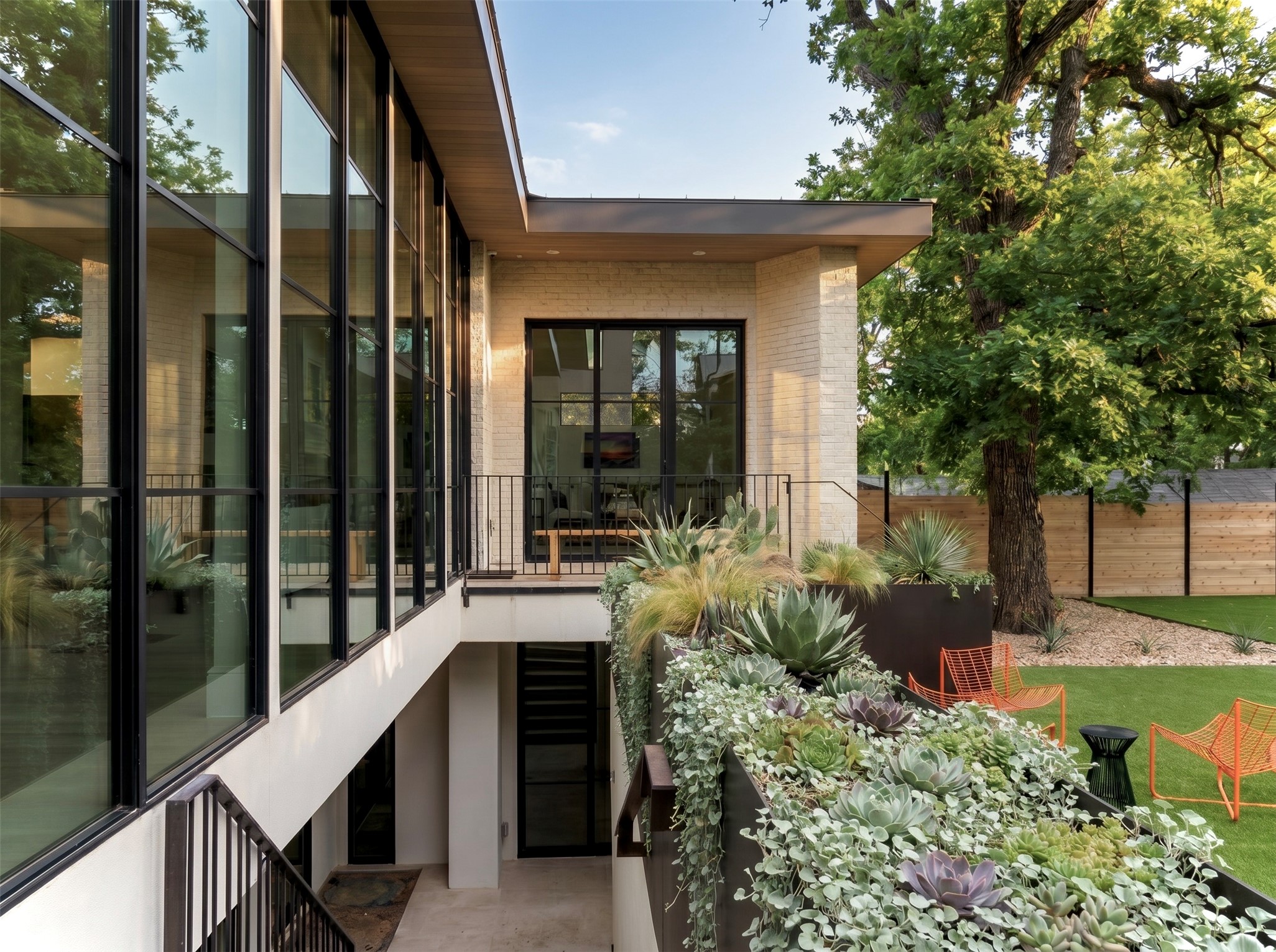 3411 Bridle Path Austin, TX 78703 - Photo 31 of 34 a view of a patio with table and chairs and potted plants
