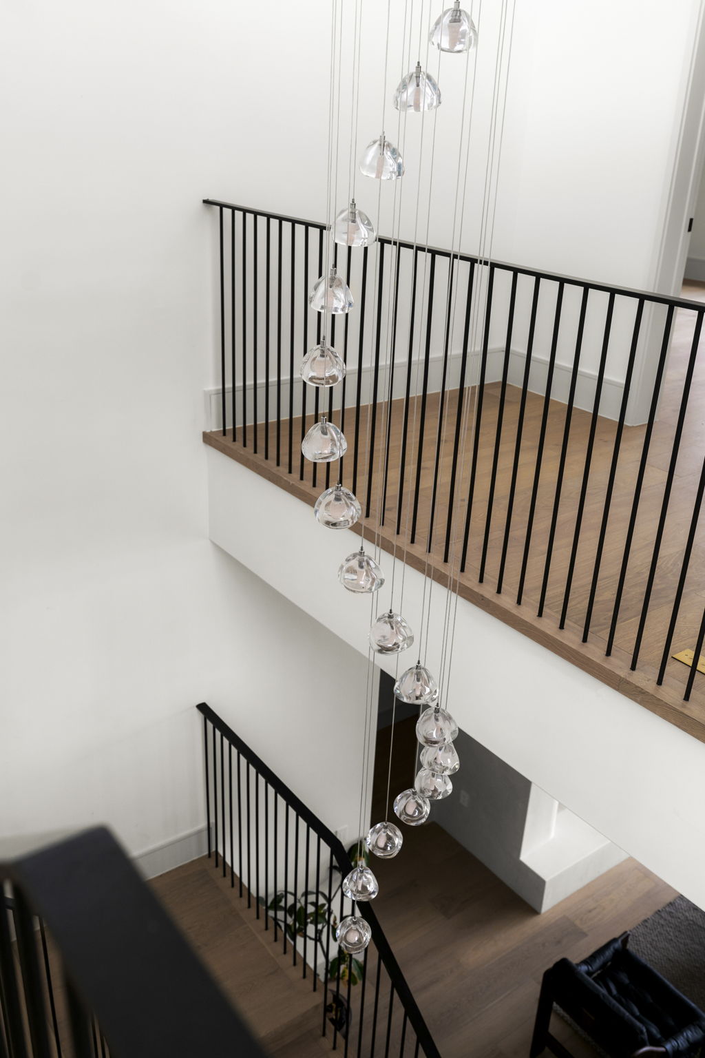 3411 Bridle Path Austin, TX 78703 - Photo 37 of 40 Staircase with wood finished floors and a high ceiling