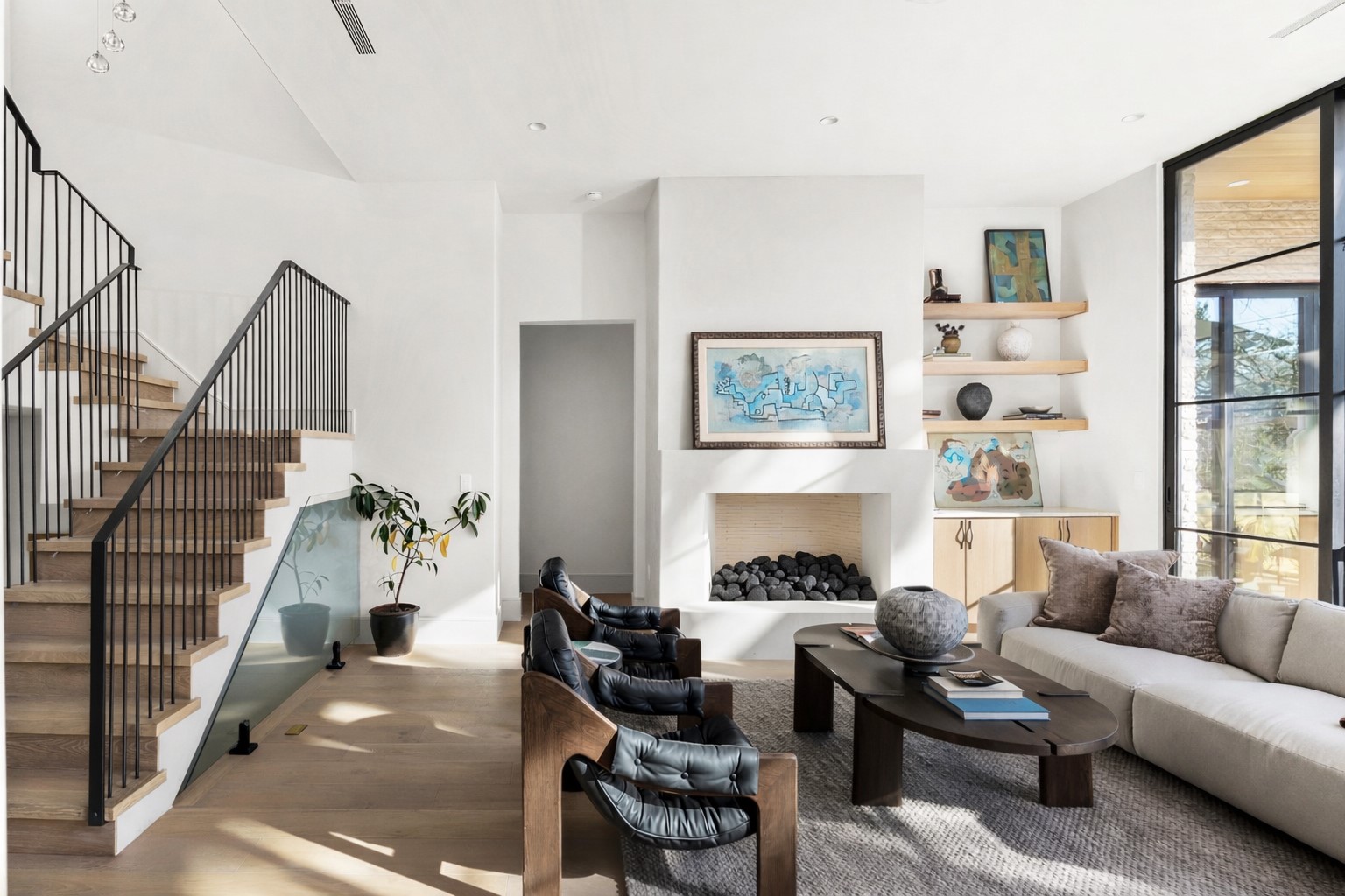 3411 Bridle Path Austin, TX 78703 - Photo 7 of 40 Living area featuring wood finished floors and expansive windows
