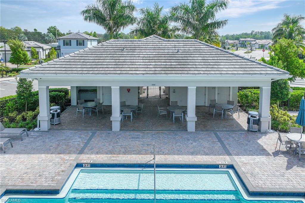 2236 Yellowfin Circle Naples, FL 34114 - Photo 38 of 39 a view of house with patio outdoor seating