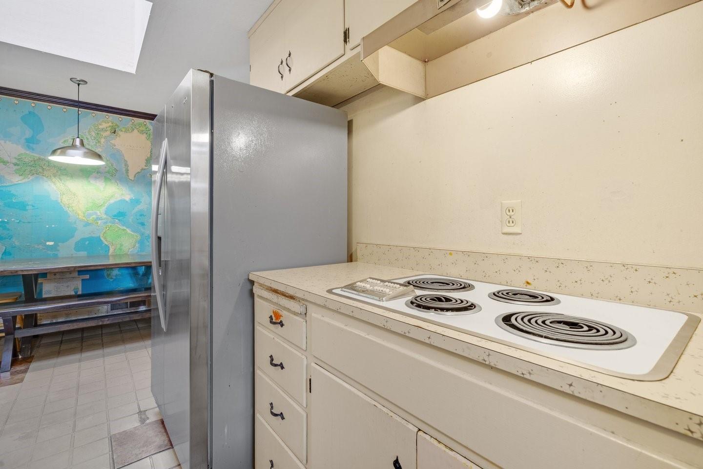 1374 Primrose Way Cupertino, CA 95014 - Photo 12 of 35 a kitchen that has a stove and a table