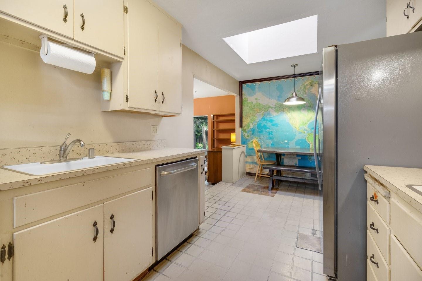 1374 Primrose Way Cupertino, CA 95014 - Photo 13 of 35 a kitchen with a sink and chairs
