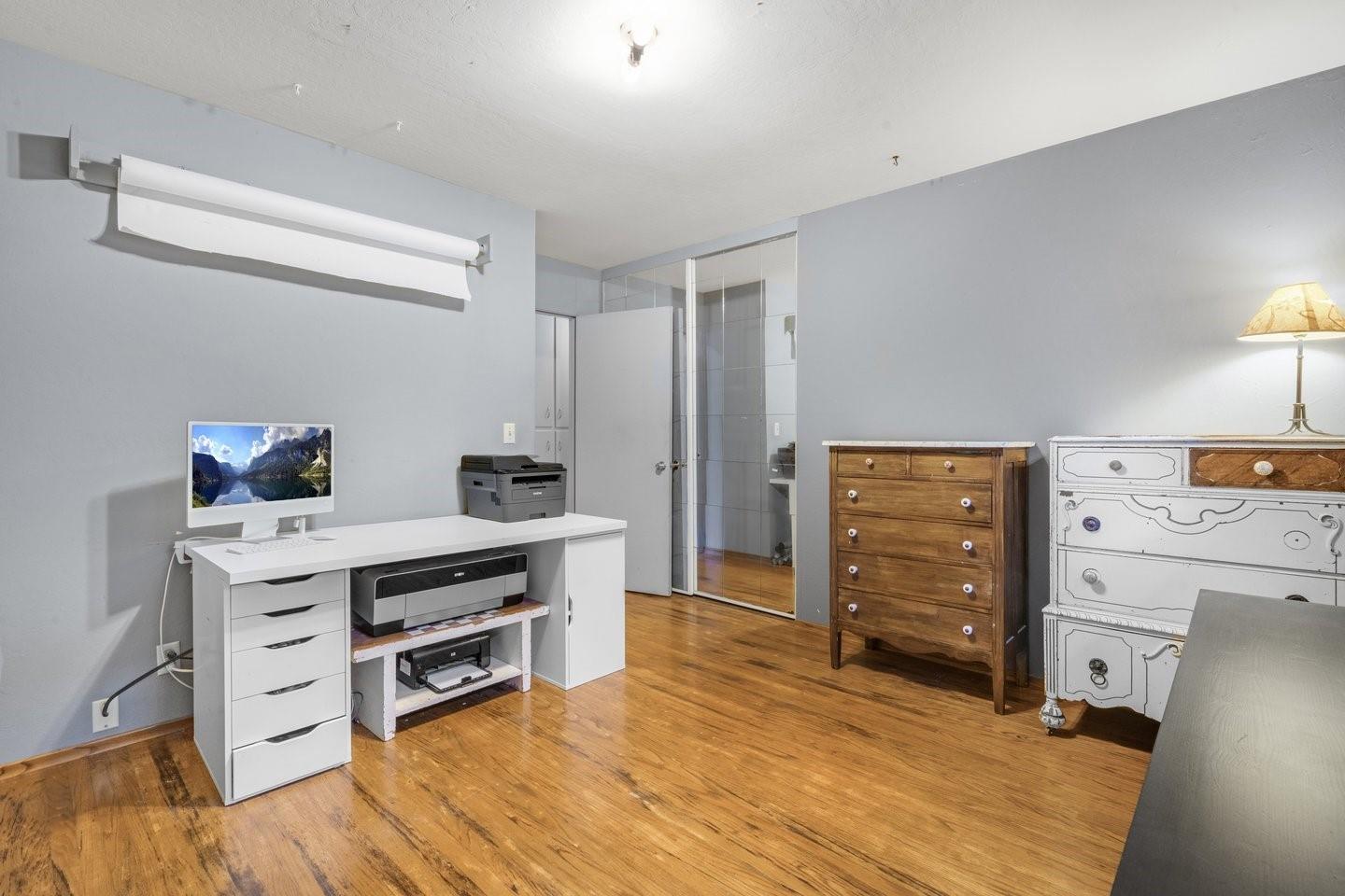 1374 Primrose Way Cupertino, CA 95014 - Photo 21 of 35 a kitchen with stainless steel appliances a stove and wooden floor