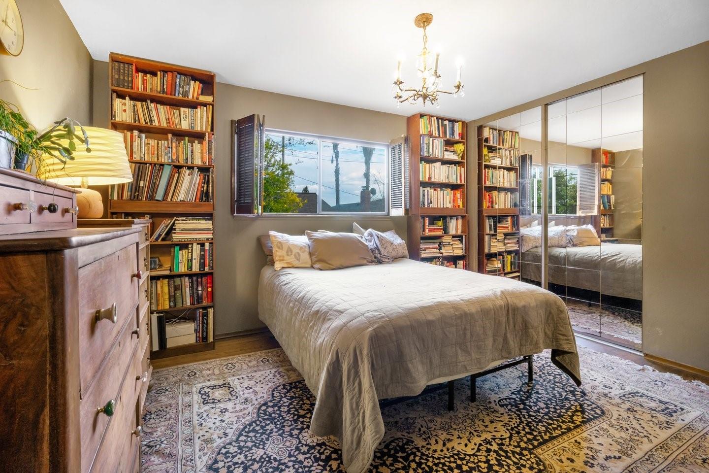 1374 Primrose Way Cupertino, CA 95014 - Photo 28 of 35 a bed sitting in a bedroom next to a large window