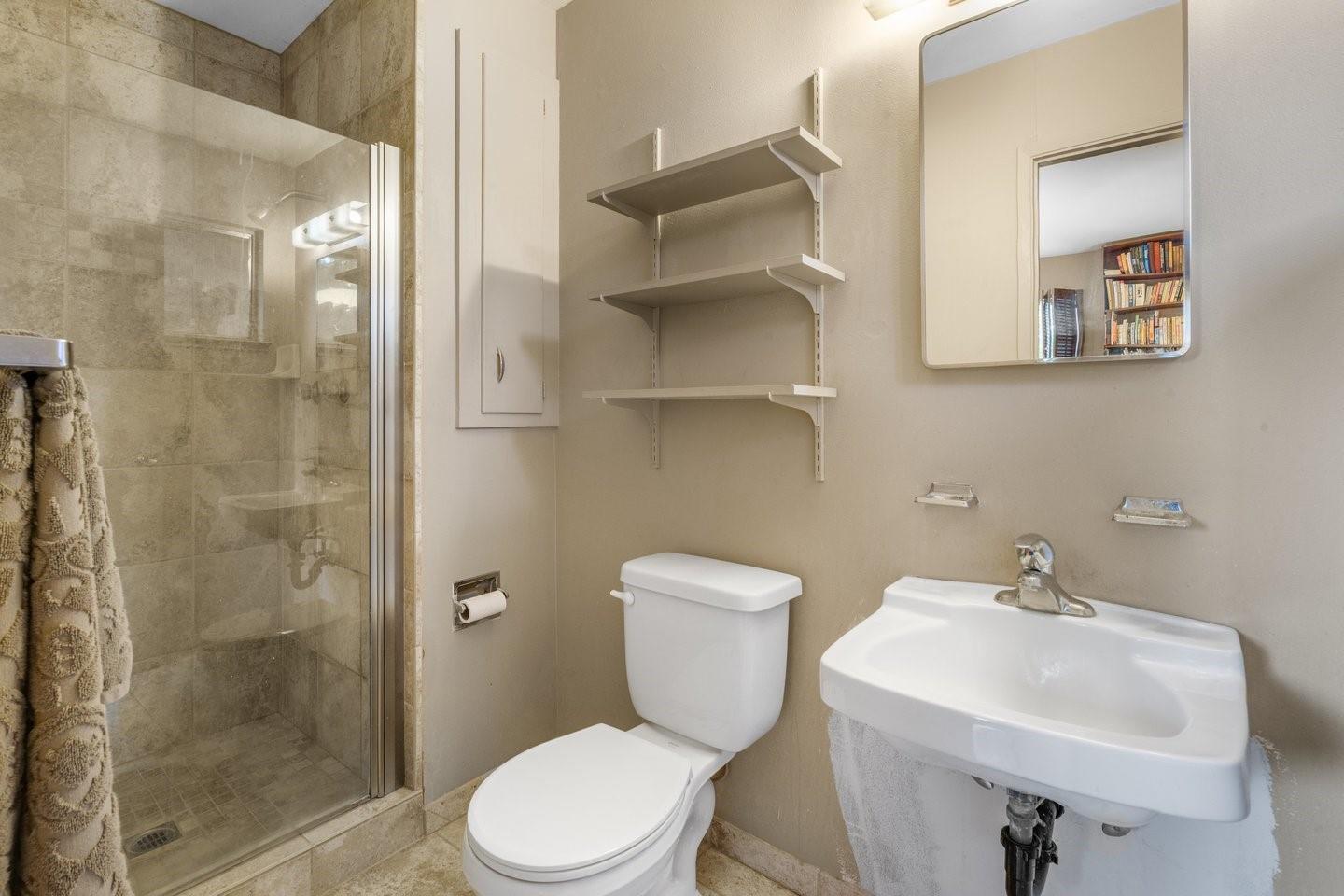 1374 Primrose Way Cupertino, CA 95014 - Photo 30 of 35 a white toilet sitting next to a bathroom sink