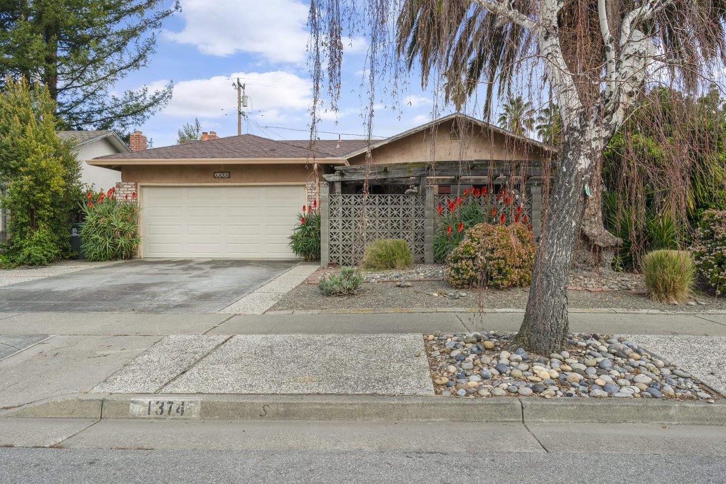 1374 Primrose Way Cupertino, CA 95014 - Photo 4 of 35 a front view of a house with yard