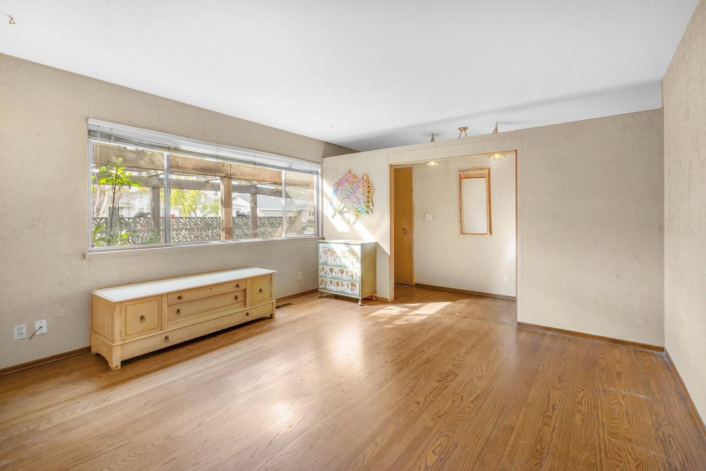 1374 Primrose Way Cupertino, CA 95014 - Photo 9 of 35 an empty room with windows