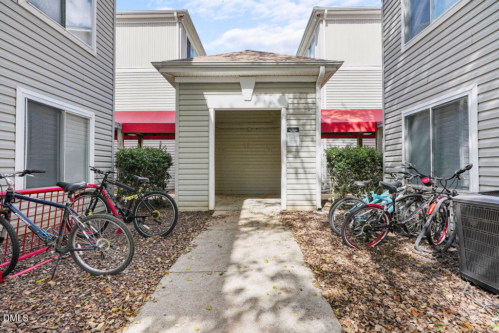 1411 Collegiate Circle, Unit 302 Raleigh, NC 27606 - Photo 38 of 43 a view of a storage room with a bike