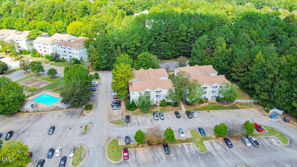 1411 Collegiate Circle, Unit 302 Raleigh, NC 27606 - Photo 42 of 43 an aerial view of house with yard