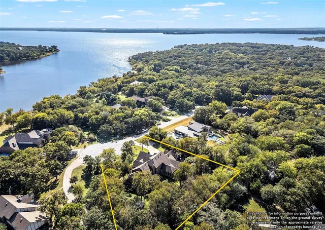 a living room with furniture fireplace and dining table