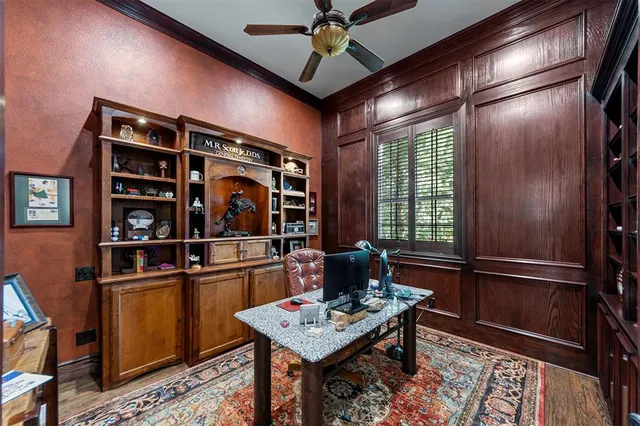 a bedroom with furniture window and wooden floor