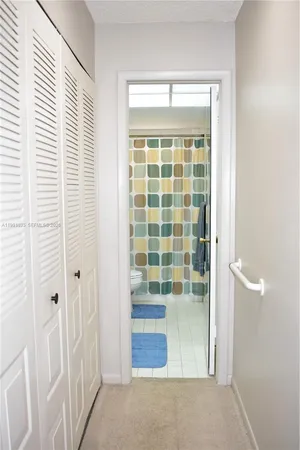 a view of wooden floor and windows in a room