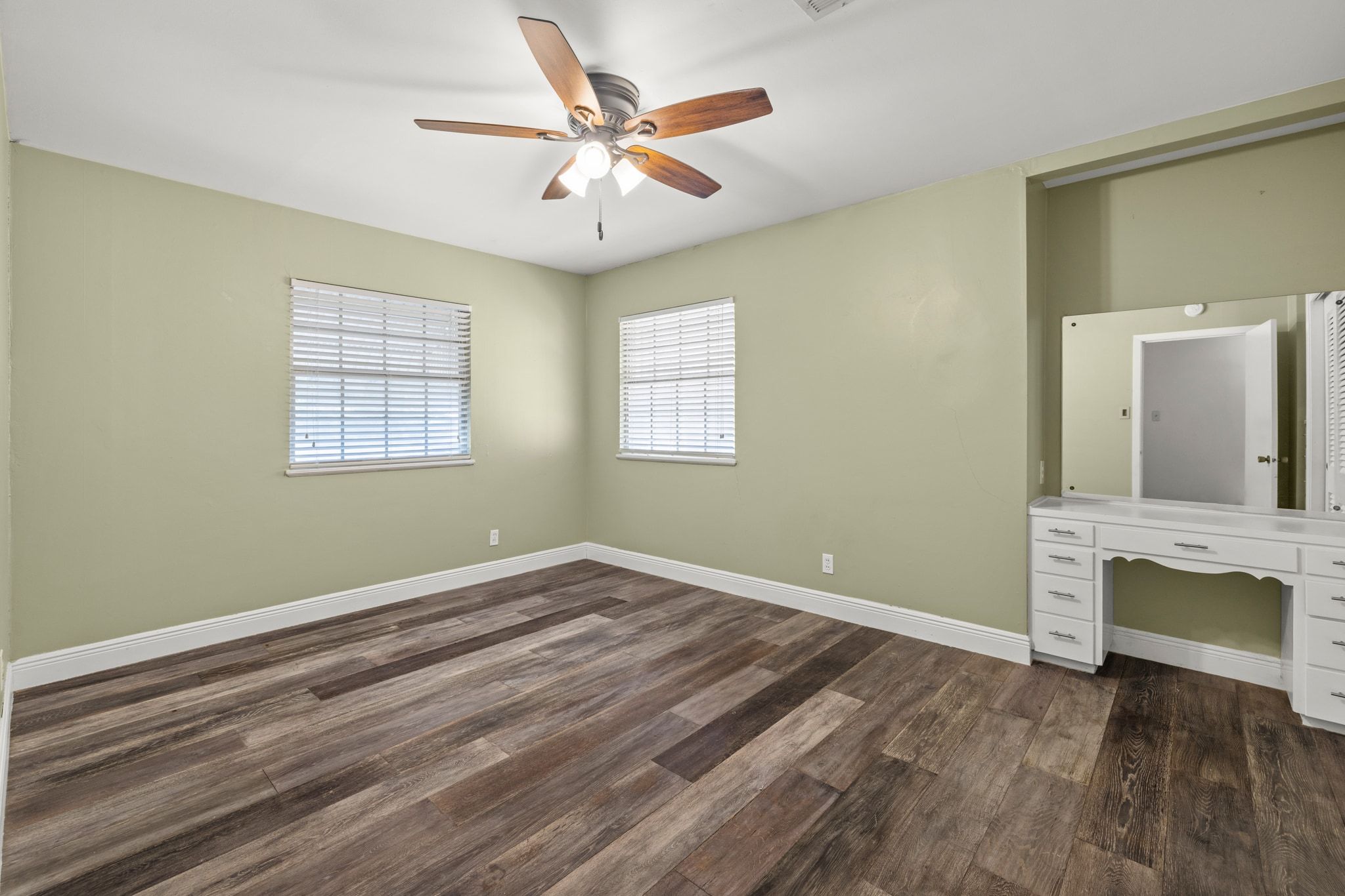 2326 Hartford Road, Unit 1/2 Austin, TX 78703 - Photo 19 of 28 wooden floor in an empty room with a window