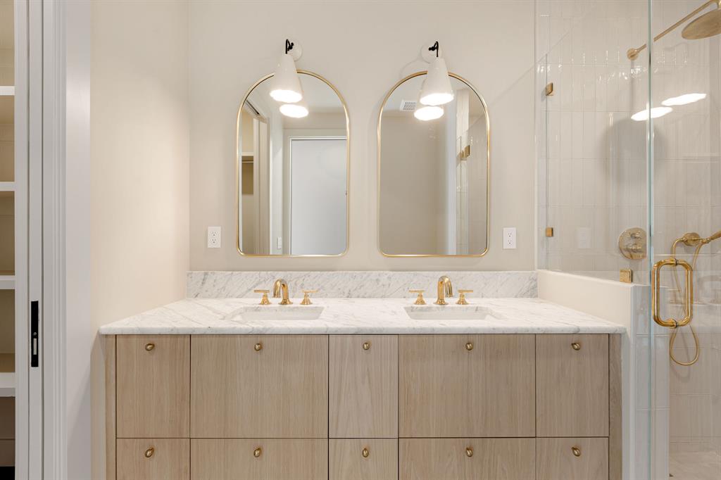 4414 Banister Lane, Unit 2 Austin, TX 78745 - Photo 20 of 28 a bathroom with a sink double vanity and a mirror