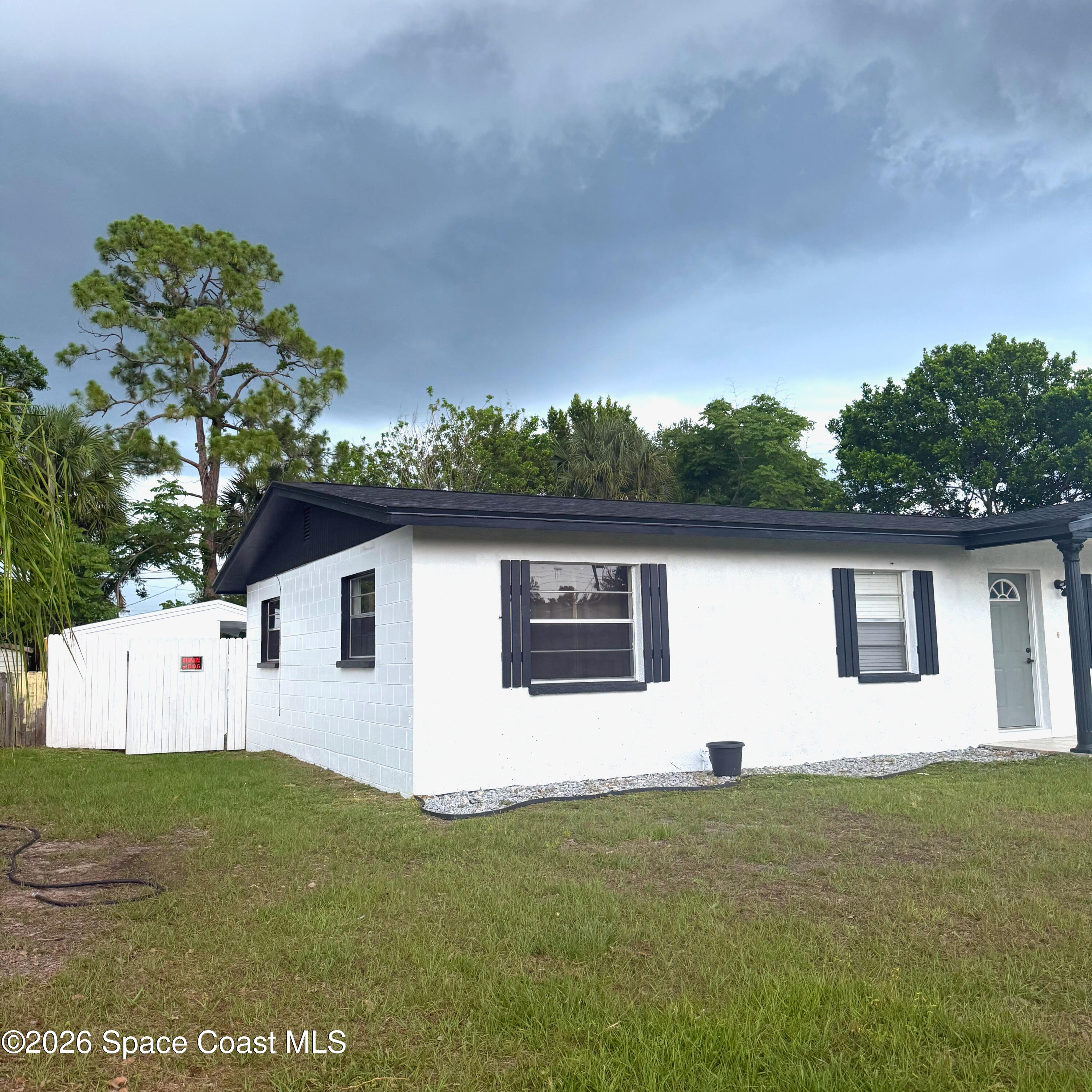 3300 Argyle Road Titusville, FL 32796 - Photo 4 of 29 a view of a house with a yard