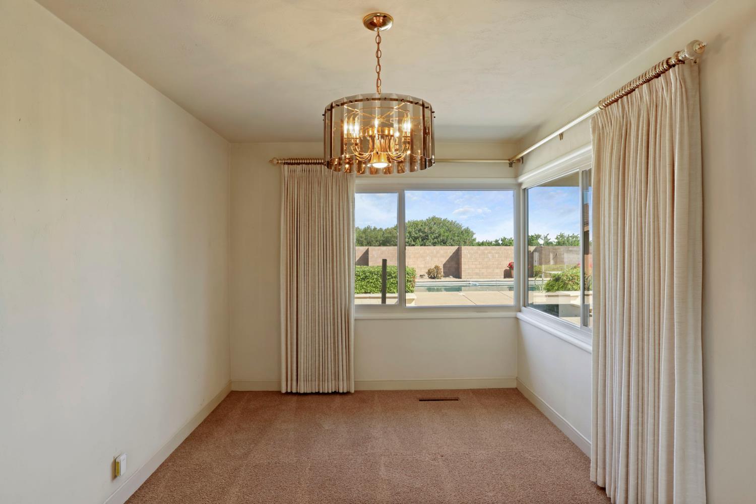 2465 Vernalis Road Tracy, CA 95304 - Photo 10 of 55 a view of an empty room with a window