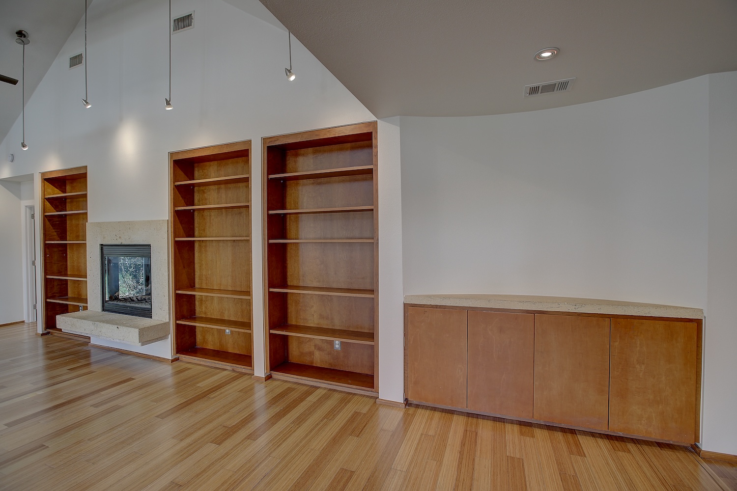 1607 South Elm Street Georgetown, TX 78626 - Photo 21 of 40 a view of an empty room with wooden floor and a window