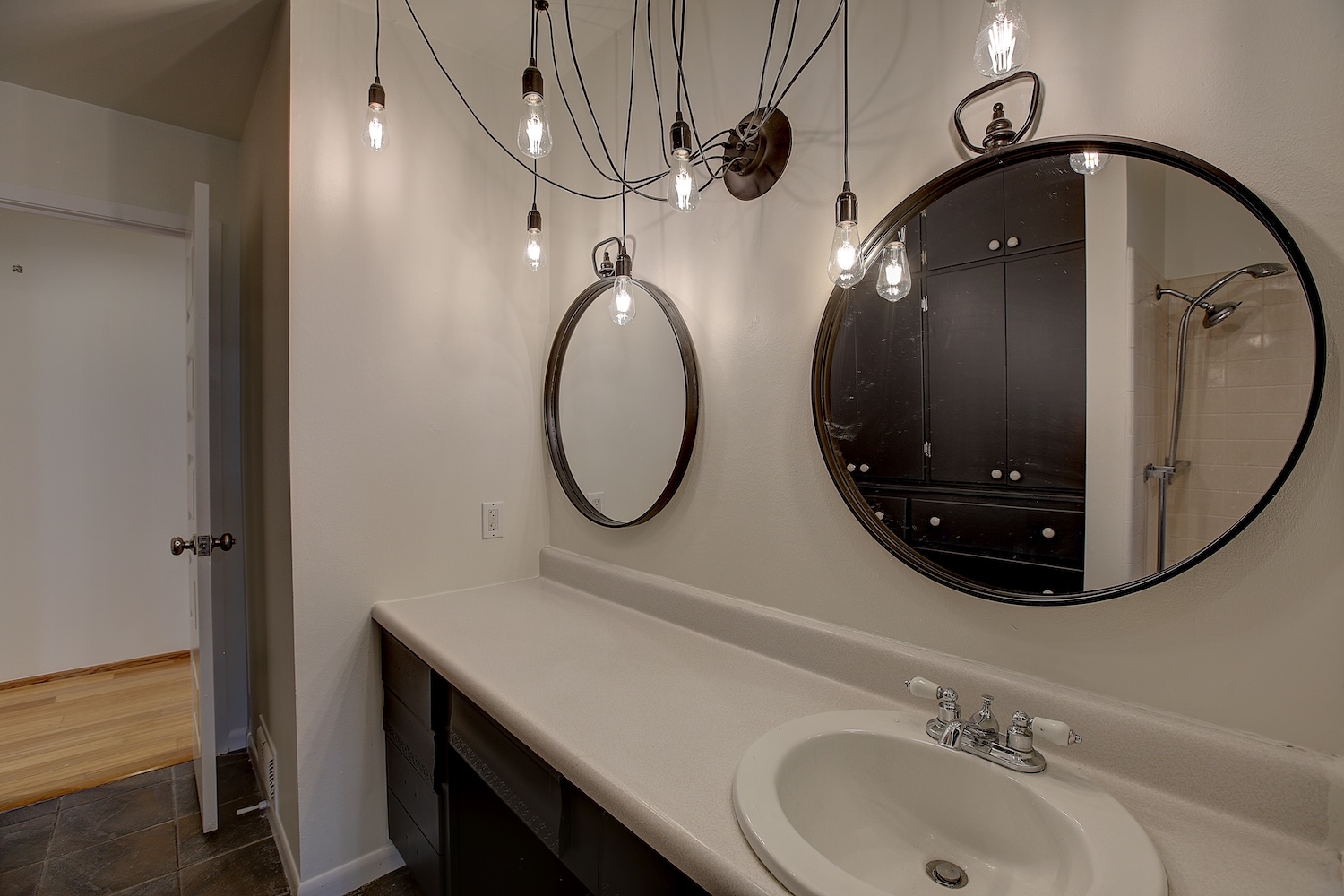 1607 South Elm Street Georgetown, TX 78626 - Photo 30 of 40 a bathroom with a sink and a mirror