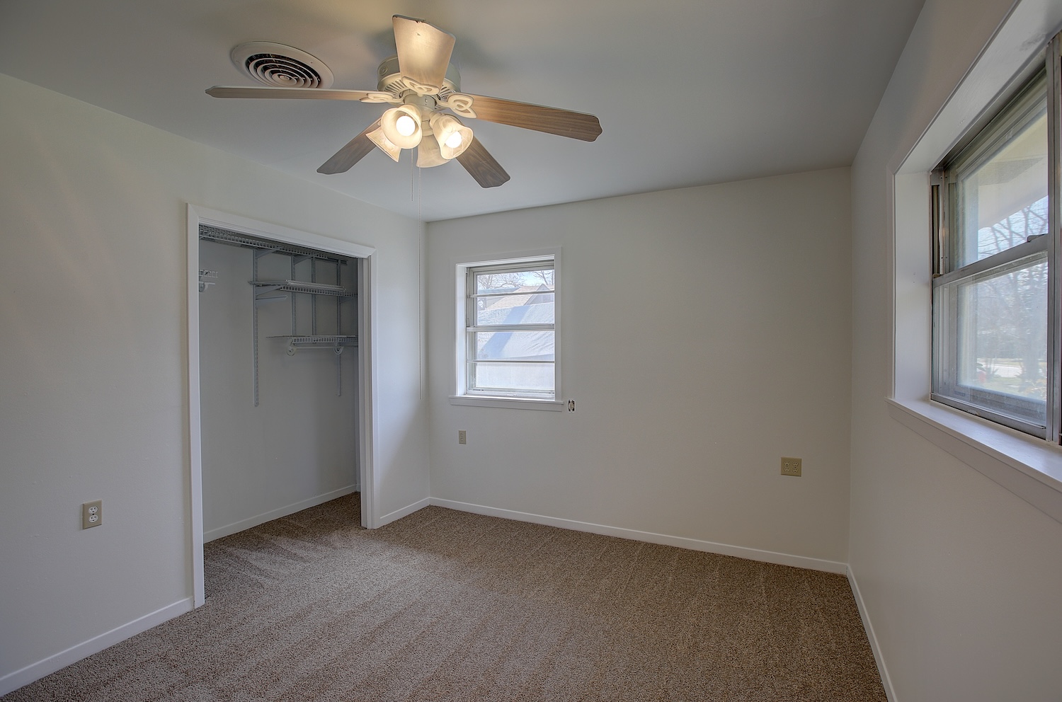 1607 South Elm Street Georgetown, TX 78626 - Photo 38 of 40 wooden floor in an empty room with a window