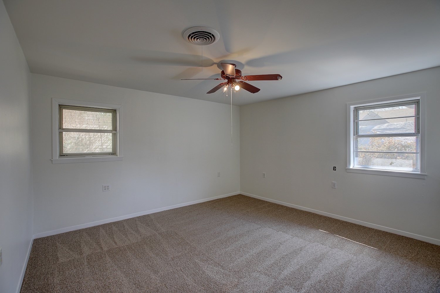 1607 South Elm Street Georgetown, TX 78626 - Photo 39 of 40 a view of a livingroom with a ceiling fan and window